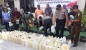 Dukung Harkamtibmas, Personel Satgas Yonif RK 136/TS ikut serta dalam pemusnahan Miras